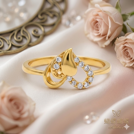 Elegant Gold Abstract Teardrop Halo Ring with Sparkling Stones for Women