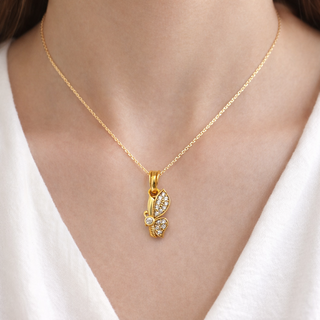 Elegant Gold Butterfly Pendant with Sparkling Stone Detailing