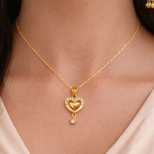 Elegant Gold Double Heart Pendant with Stone Detailing